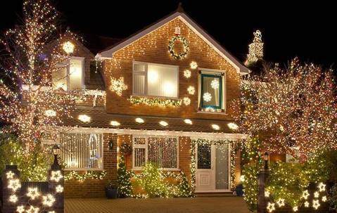 The facade of a house with Christmas lights